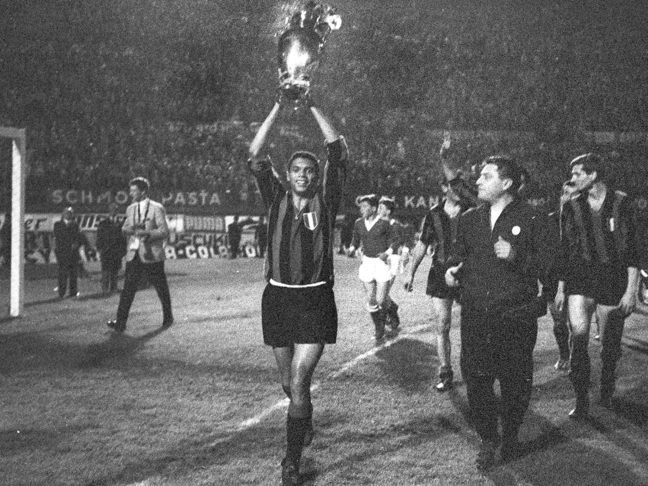 Inter Milan winger Jair holds the European Cup aloft in 1964