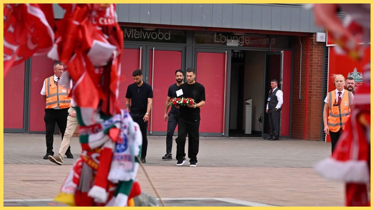Ruben Amorim, Bruno Fernandes and Diogo Dalot lay flowers on behalf of Manchester United at the Diogo Jota memorial at Anfield