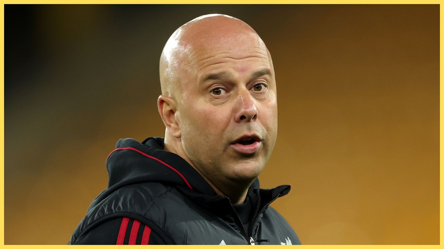 Arne Slot looks surprised during Liverpool game.