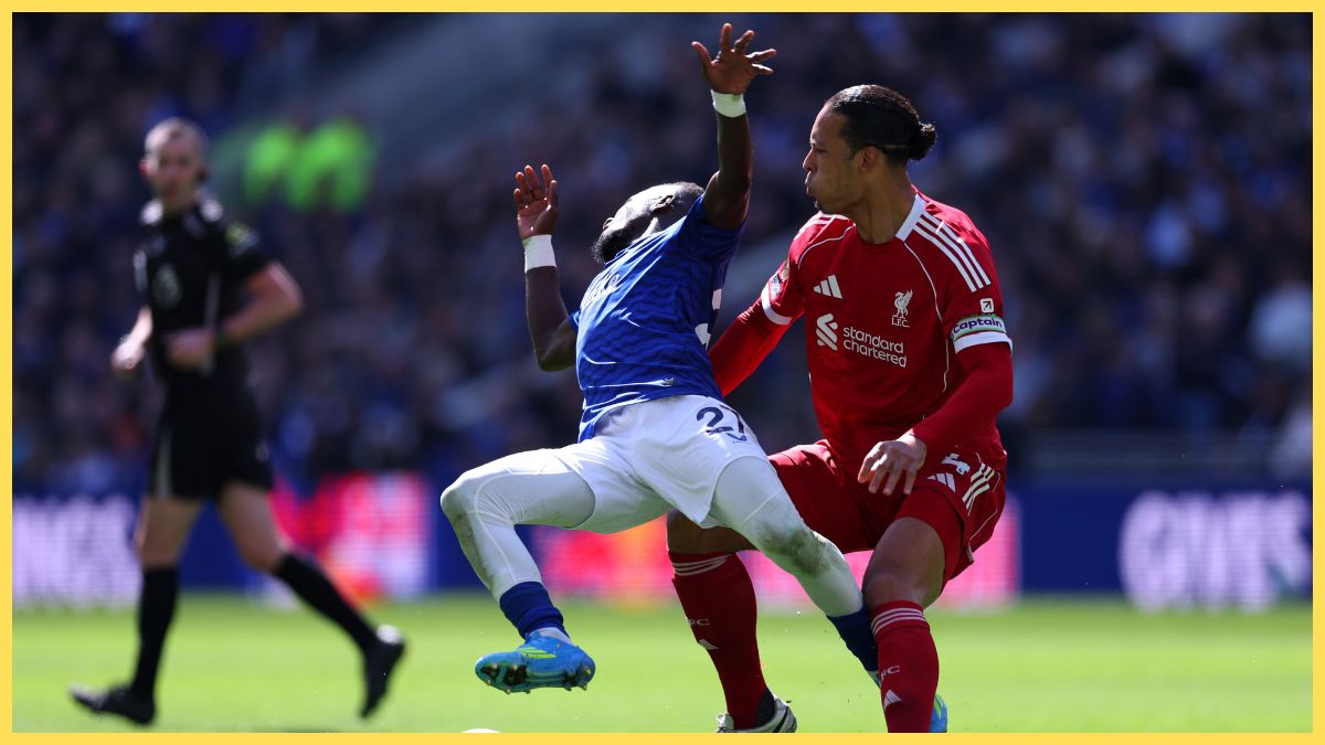 Idrissa Gueye of Everton is challenged by Virgil van Dijk of Liverpool during the Premier League match between Everton and Liverpool at Hill Dickinson Stadium
