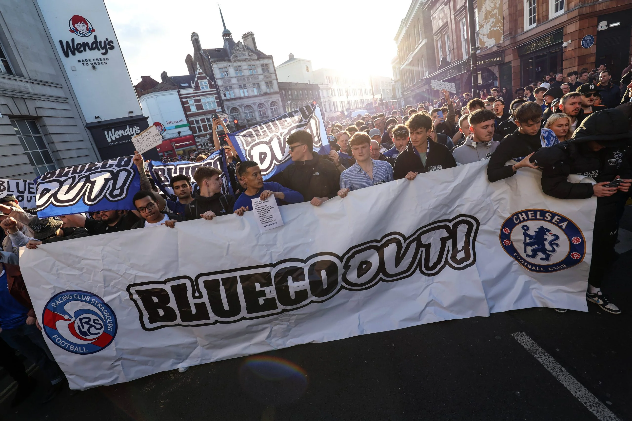 Chelsea fans protest against club owners, BlueCo prior to the Premier League match between Chelsea and Manchester United at Stamford Bridge