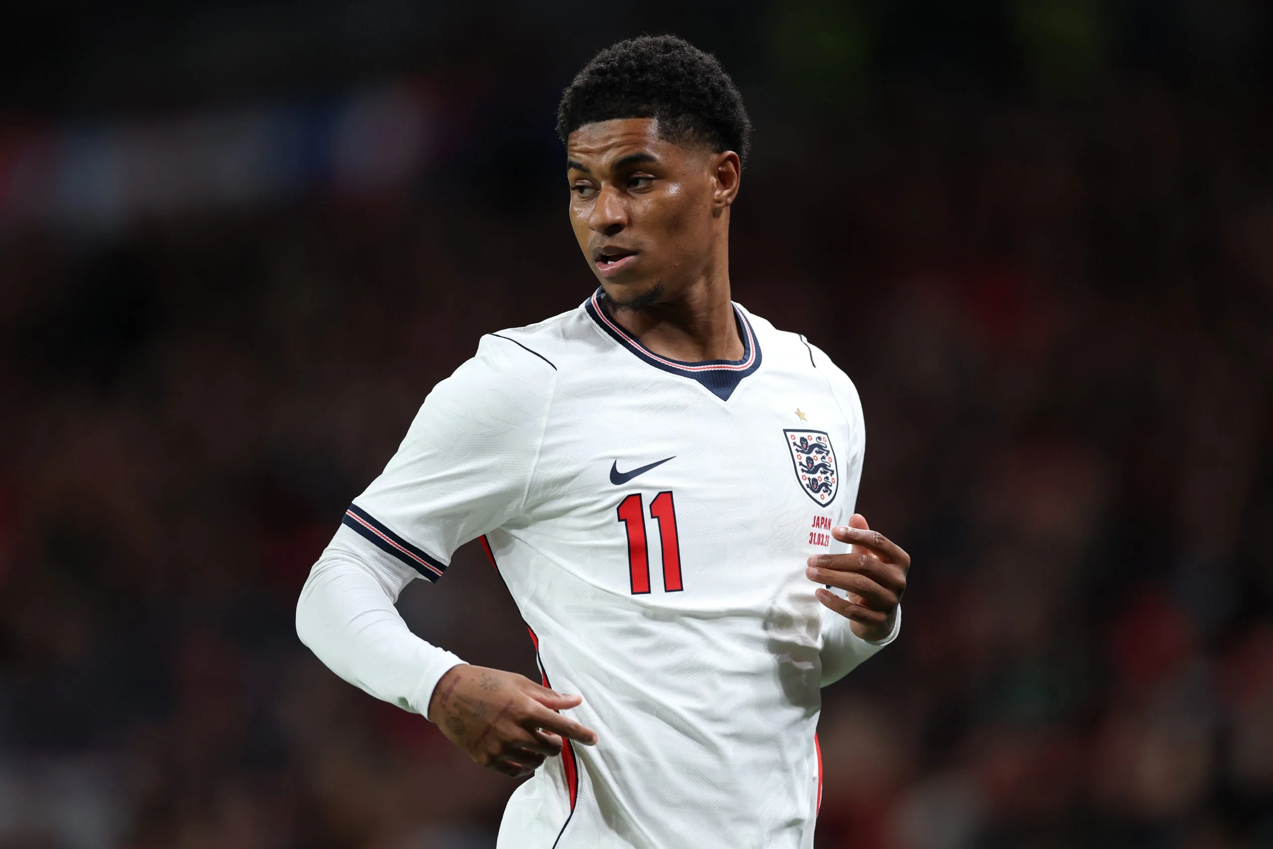 Marcus Rashford playing for England.