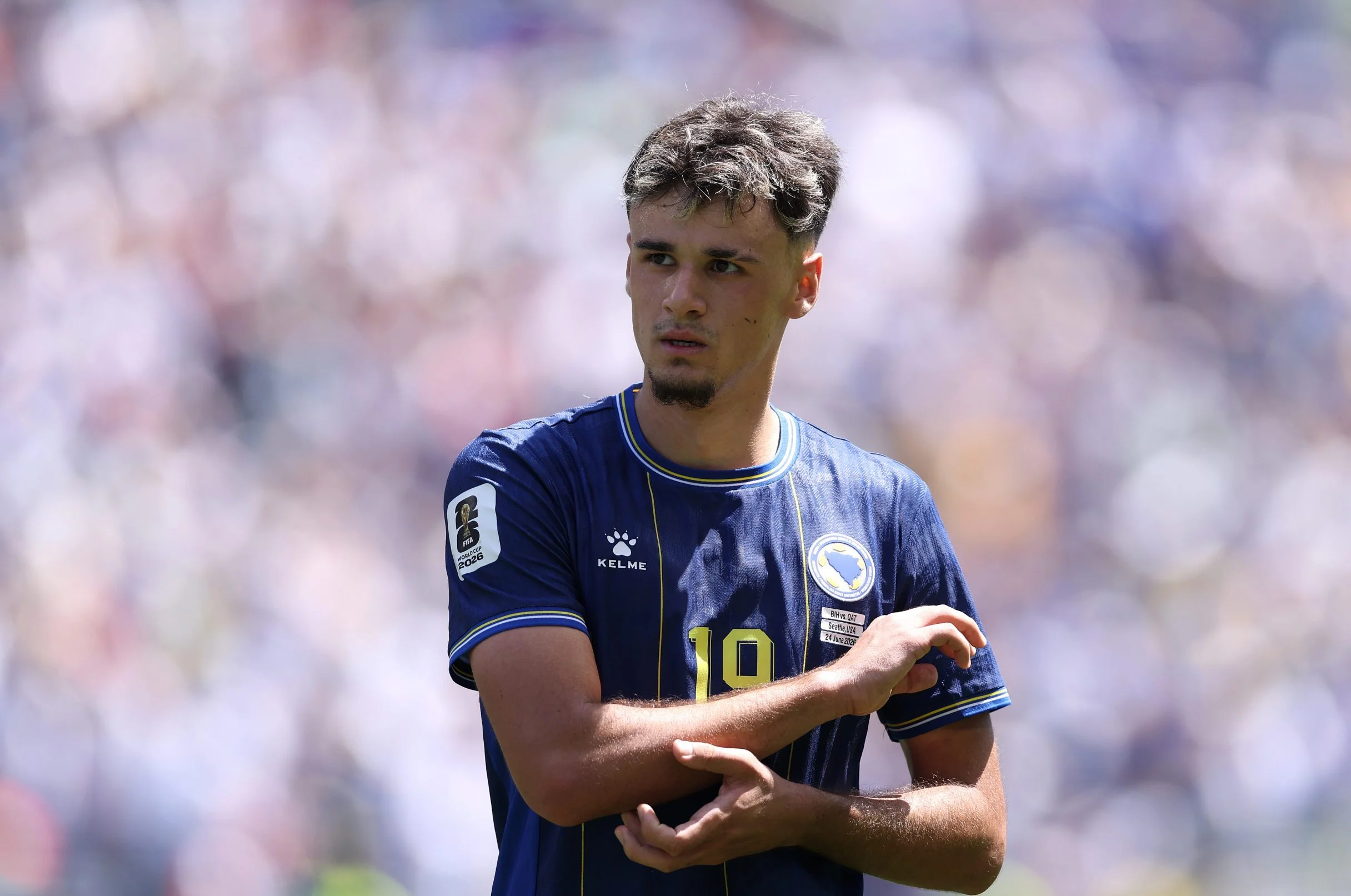 Kerim Alajbegovic #19 of Bosnia and Herzegovina in action during the FIFA World Cup 2026 Group B match between Bosnia and Herzegovina and Qatar at Seattle Stadium on June 24, 2026 in Seattle, Washington.