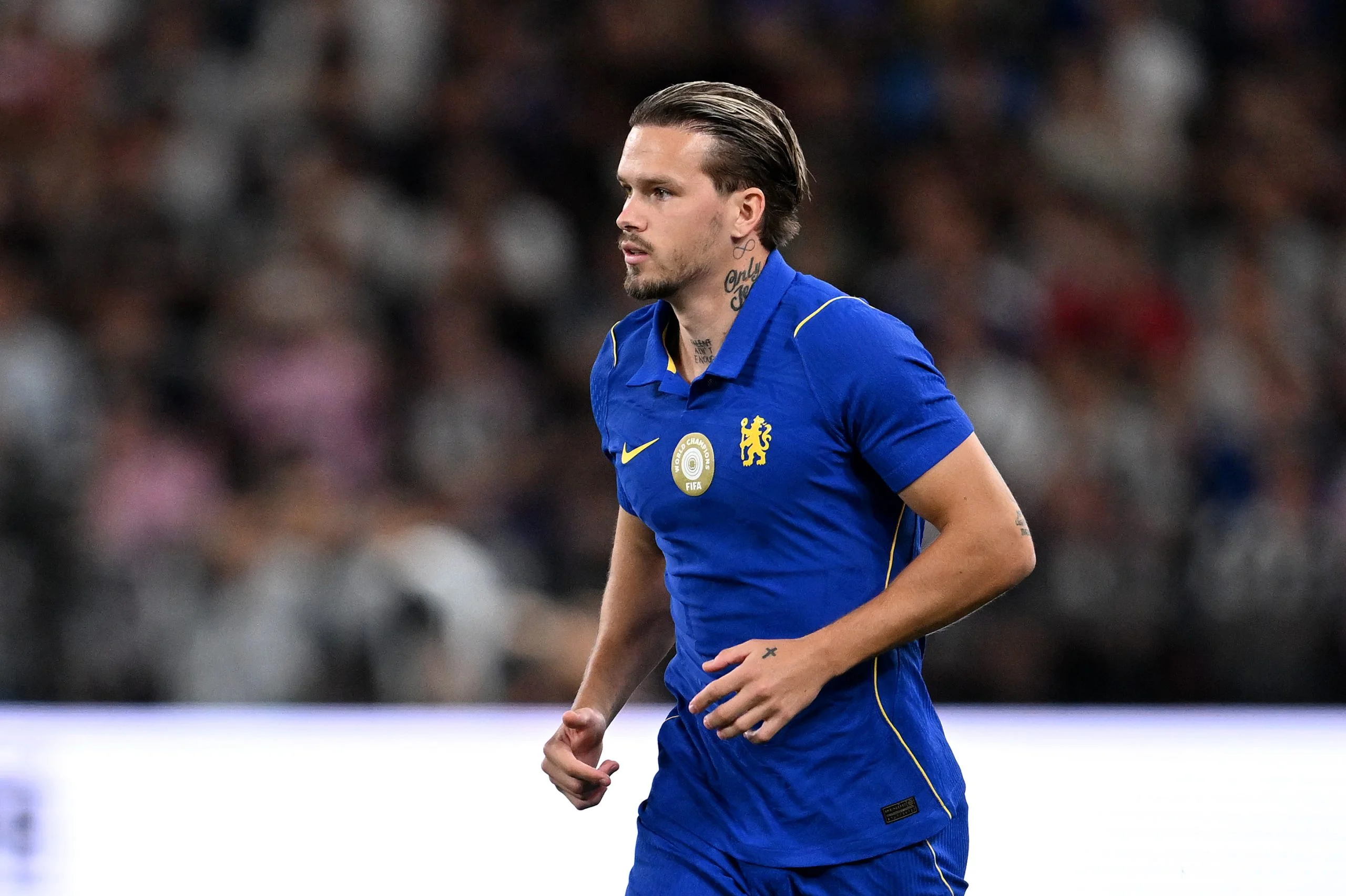 Mykhailo Mudryk of Chelsea enters the pitch