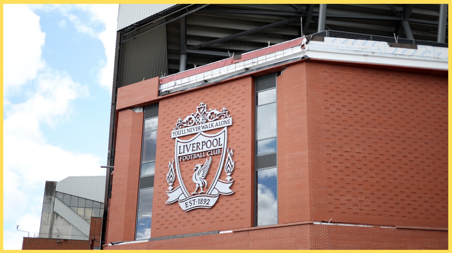 An image of the Liverpool crest on the exterior wall of Anfield