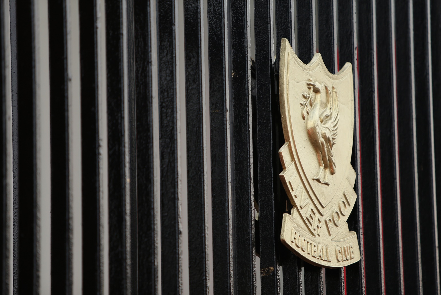 A bust of the Liverpool crest is featured on the gate outside Anfield