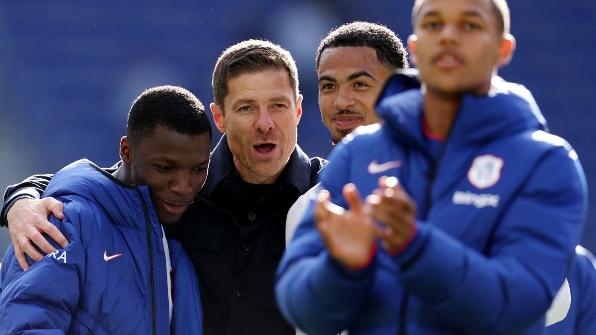 Xabi Alonso celebrates a win with Moises Caicedo.